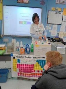 ”Chemistry is pHun” for eighth graders demonstrated by Amy Kerkemeyer (shown) and Sheryl Loux (program Coordinator).