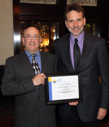 Outstanding Chemical Technology Student awardee: Jordan W Aach (left), with Michael Hauser presenting
