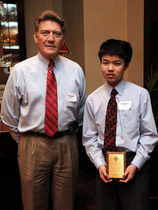The winner of the High School Chemistry Contest Advanced Division is Ladue High School student Runpeng Liu, here with his teacher, Carl Tenpas.