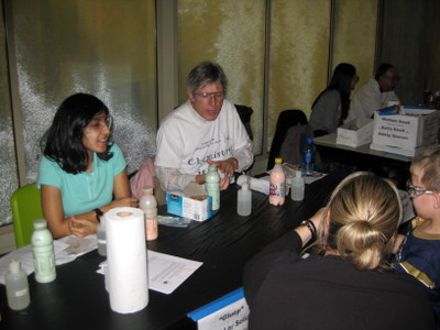 Shreya Ahuja and Chris Glass help with making “Gluep”