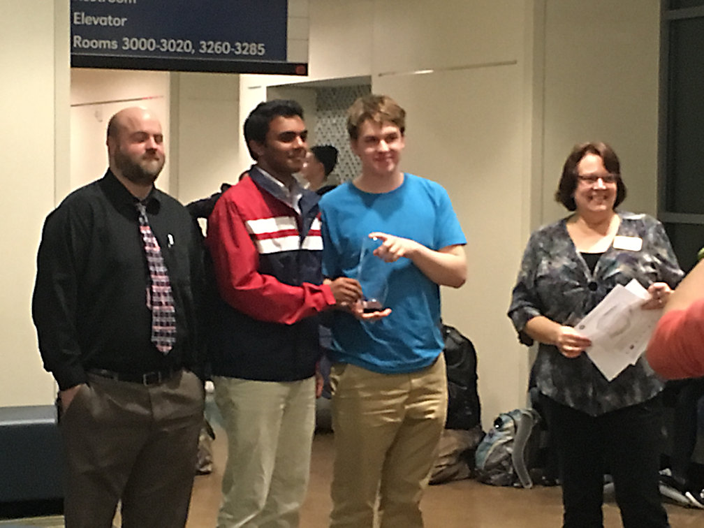 Winners Vignesh Janardhanam and Alexander Curylo flanked by their teacher Justin Little (far left) and titrator-in-chief Leah O’Brien (far right)