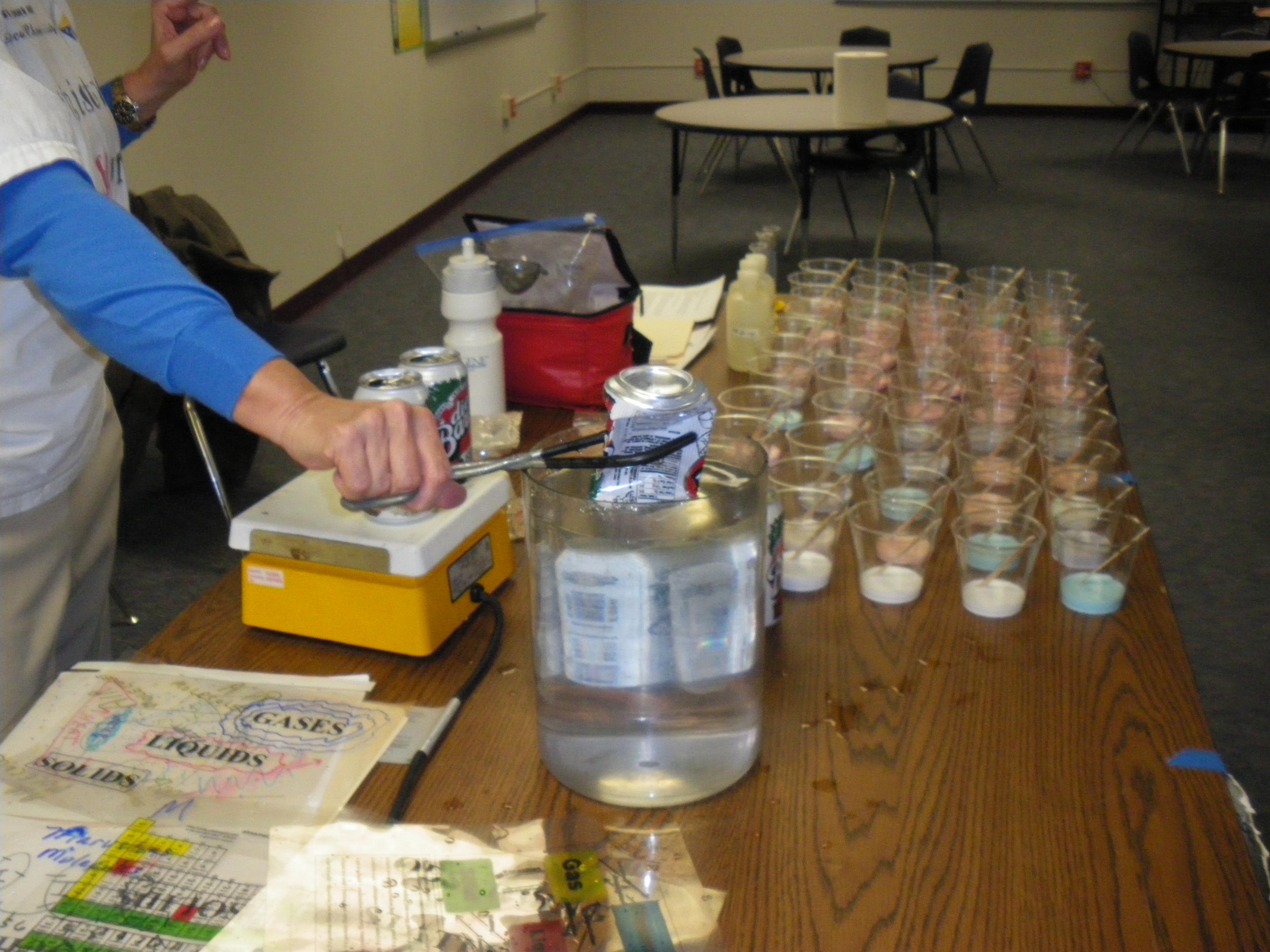 Sheryl Loux’s arm in the Crushing Cans demonstration