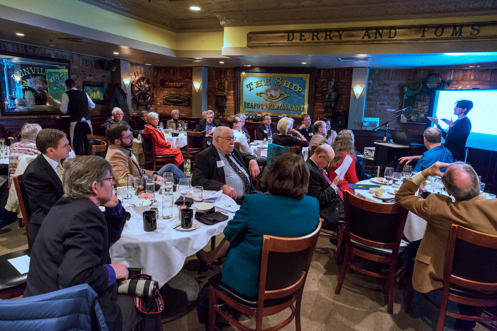 Crowd tunes in to after-dinner talk by Pegah Jalili