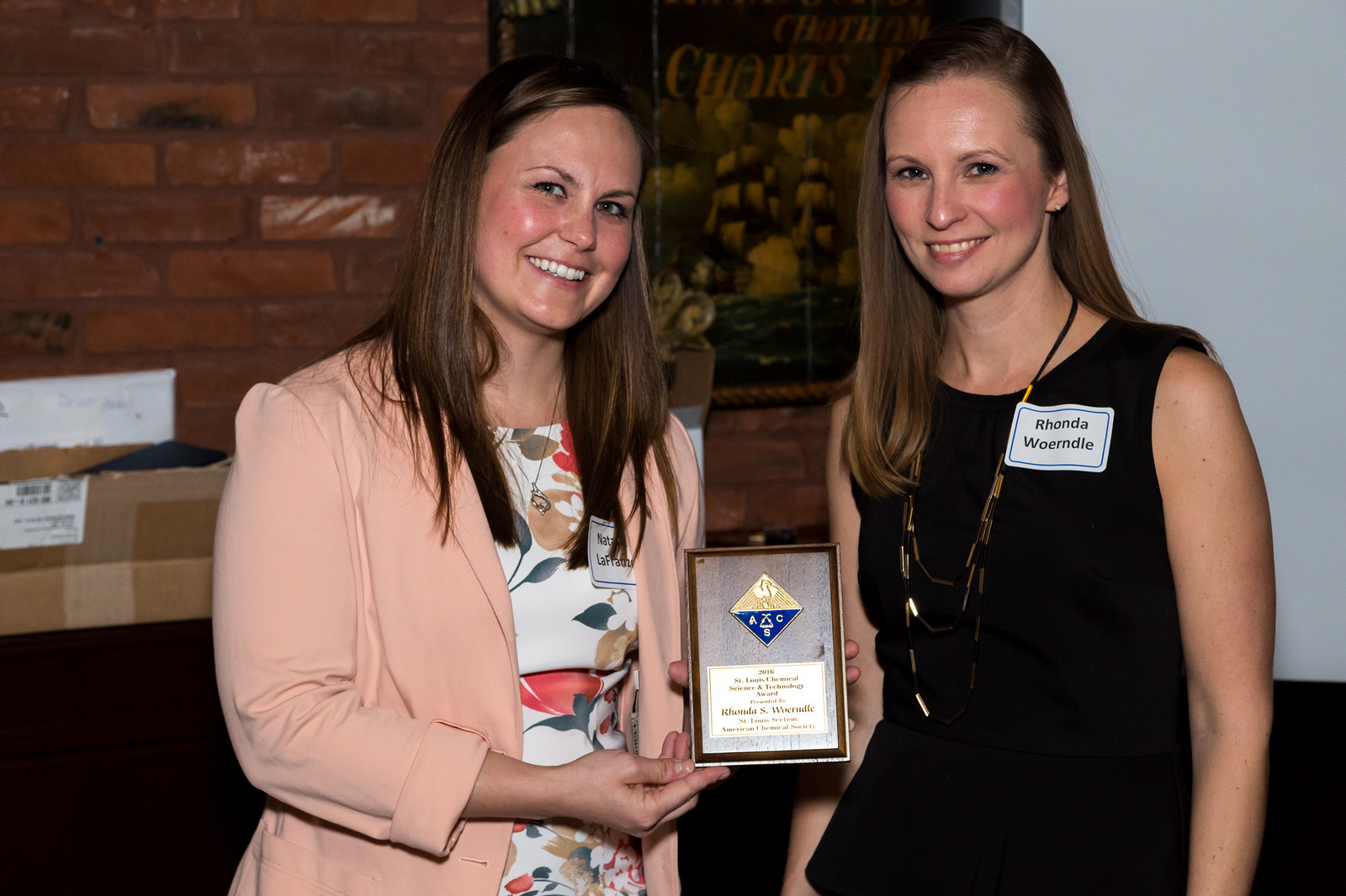 Natalie LaFranzo presenting the Science & Technology Award to Rhonda Woerndle
