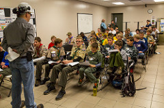 EHS Manager Justin Kuehnel prepares to teach the scouts about proper personal protective equipment.