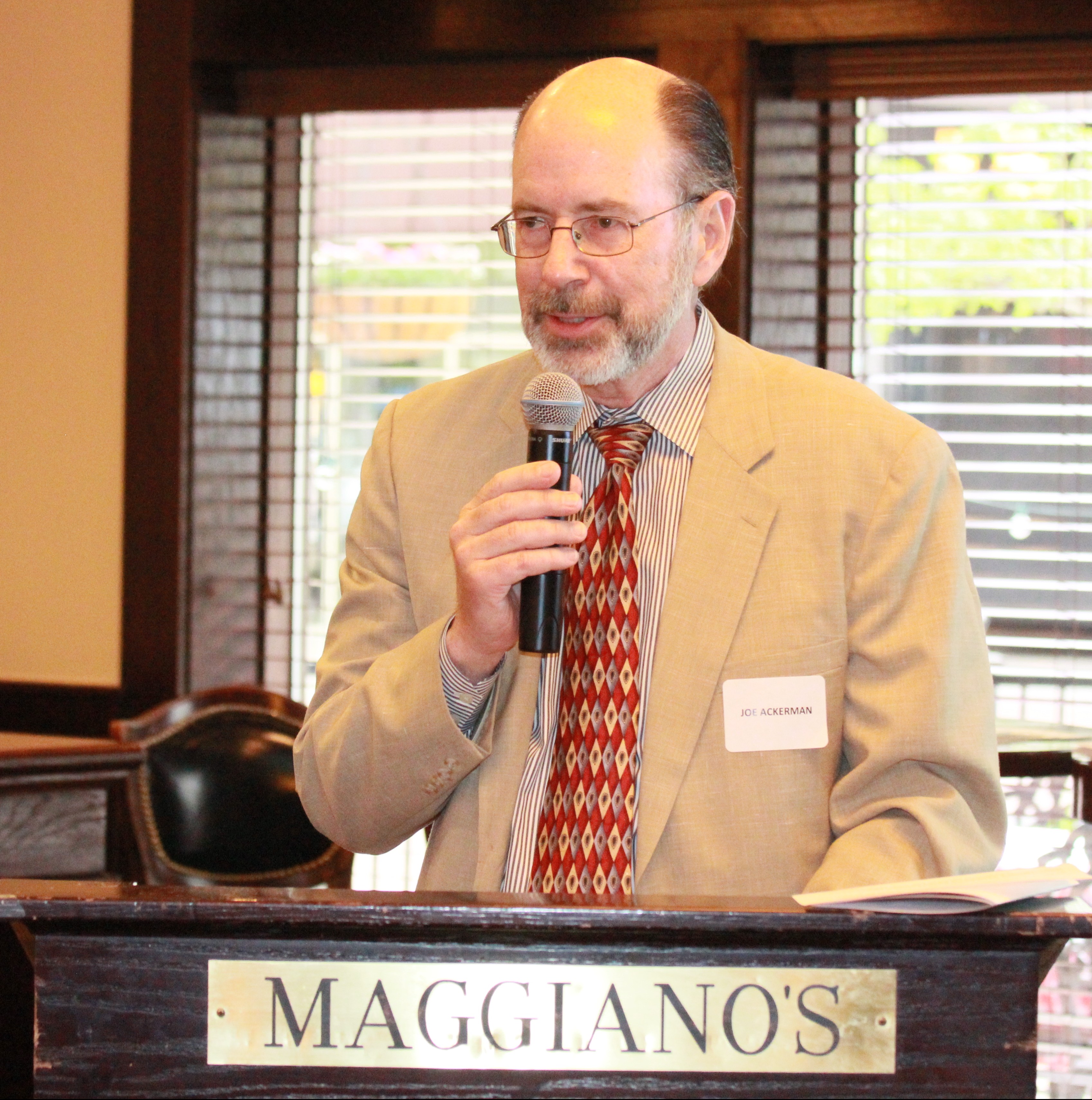 Joe Ackerman giving the introduction at Awards Night 2016