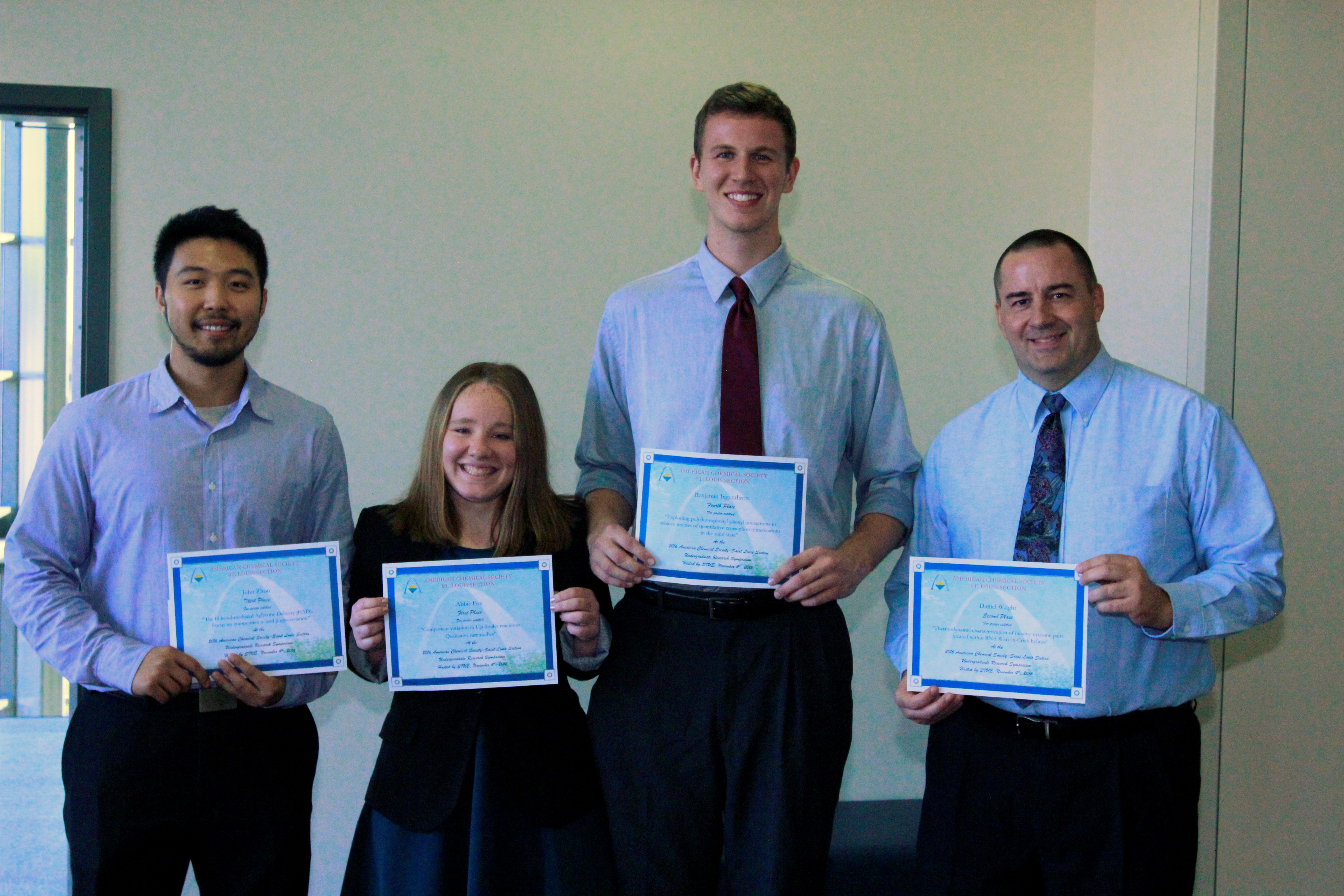 Award recipients at the 2016 Undergraduate Research Symposium, from left to right: John Zhou (UMSL, 3rd place), Abbie Fox (SIUE, 1st place), Ben Ingenthron (Webster University, 4thplace), Daniel Wright (SLU, 2nd place) (photo Jim O’Brien)